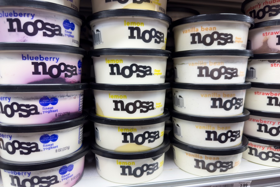 Noosa brand yogurt containers on supermarket dairy shelf Noosa brand yogurt containers on supermarket dairy shelf