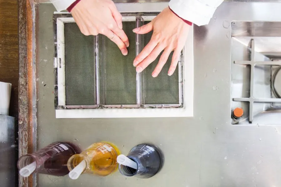 A person's hands on a material