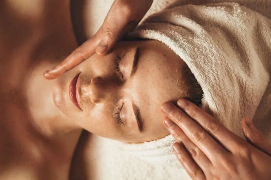 woman with a head towel getting a massage woman with a head towel getting a massage