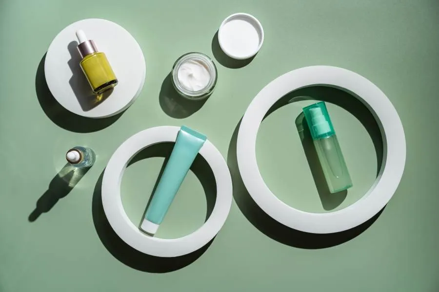 skin care products on a green table skin care products on a green table