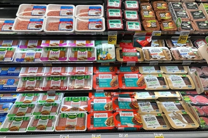 Plant-based meat on supermarket shelf.