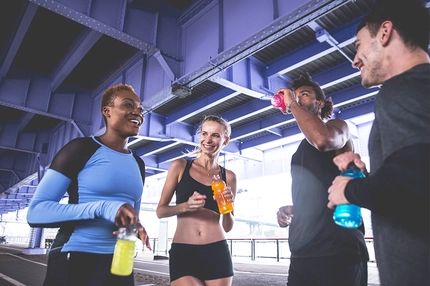Image Runners in New York drinking sports beverages.