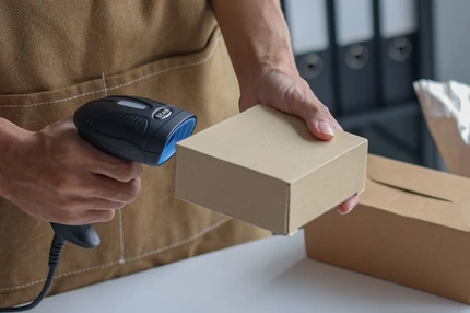 Image A person holding a box