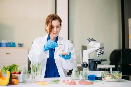 Image female scientist working in lab with food samples