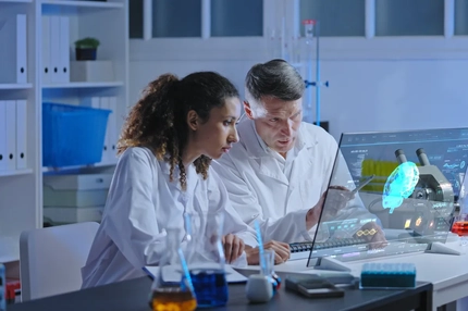 Image Two researchers in brain lab