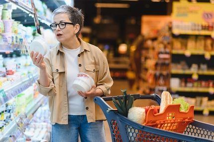 Older consumer shopping for healthy food products.