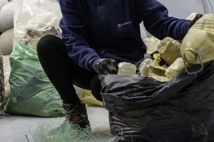 Image man collecting marine litter