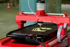 red colored 3d printer printing pancake dough red colored 3d printer printing pancake dough