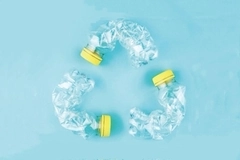 A recycling symbol made of plastic bottle. A recycling symbol made of plastic bottle.