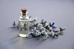 perfume bottle and flowers