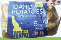 Potatoes in plastic bag.