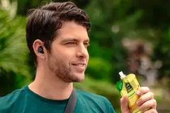 Man drinking from spouted pouch