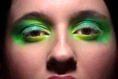 woman with green makeup