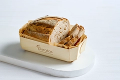 pulse based sourdough bread on paper tray on white board
