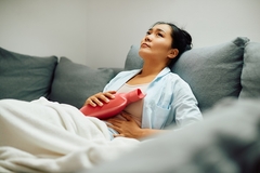 Woman with stomach pain
