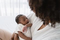 African mother with infant