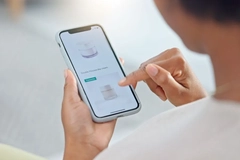 Someone buying beauty products on their phone.
