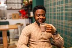 Man enjoying a hot chocolate