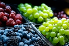 A group of different colored fruits