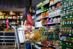 Woman shopping in grocery store