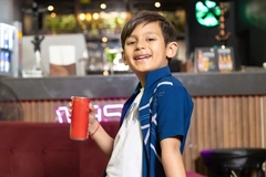 boy drinking from can boy drinking from can