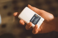 hand holding skincare applicator hand holding skincare applicator