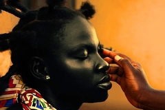 woman getting traditional makeup applied