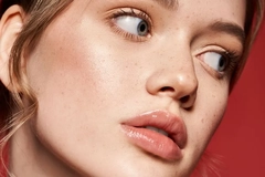 woman against red backdrop woman against red backdrop