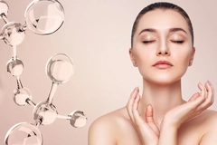 Glassy molecules next to a woman's face.