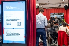 Image People attending the World Economic Forum 2026.