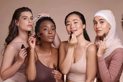Image Four women with makeup products