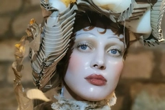 Image Model from Maison Margiela runway show in 2024 with Pat McGrath glass skin, doll makeup look