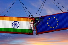 Image An India and an EU shipping crate smashing together.