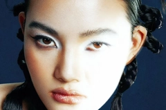 Image Woman with trendy hair style and light on her face