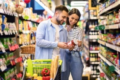 Couple shopping in the supermarket Couple shopping in the supermarket