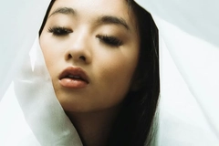 Image Young woman with makeup look in white background