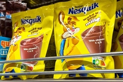 nesquick cholocate powder on shelf