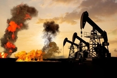 Image oil rig surrounded by explosions
