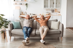 Image older couple relax on couch