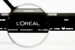 Loreal website with a magnifying glass over it.