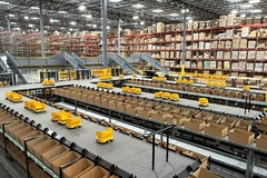 A warehouse with rows of boxes