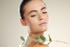 Image woman with eucalyptus leaf