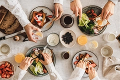 Image Family or friends having breakfast or brunch together, top view