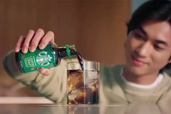 Image Consumer pouring Starbucks Coffee Craft concentrate.