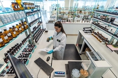 female scientist working in flavor lab female scientist working in flavor lab