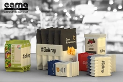 Cama Group #GoWrap packaging display featuring wrapped ready meals, snacks, and confectionery products.