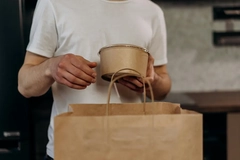Image man with paper packaging