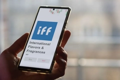 Image A hand holding a phone that says IFF.
