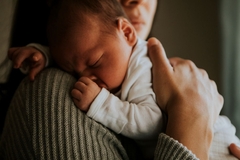 woman holding baby