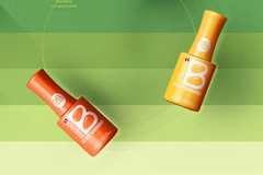Image Two nail polish bottles.